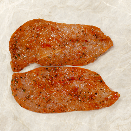 Sliced marinated halal chicken breast from Cedar Food Group Sydney